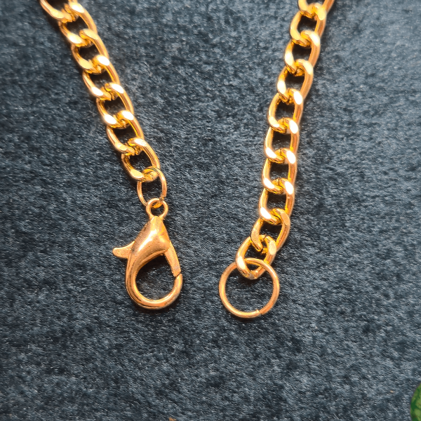 Gold lobster clasp and chain extender for secure fit